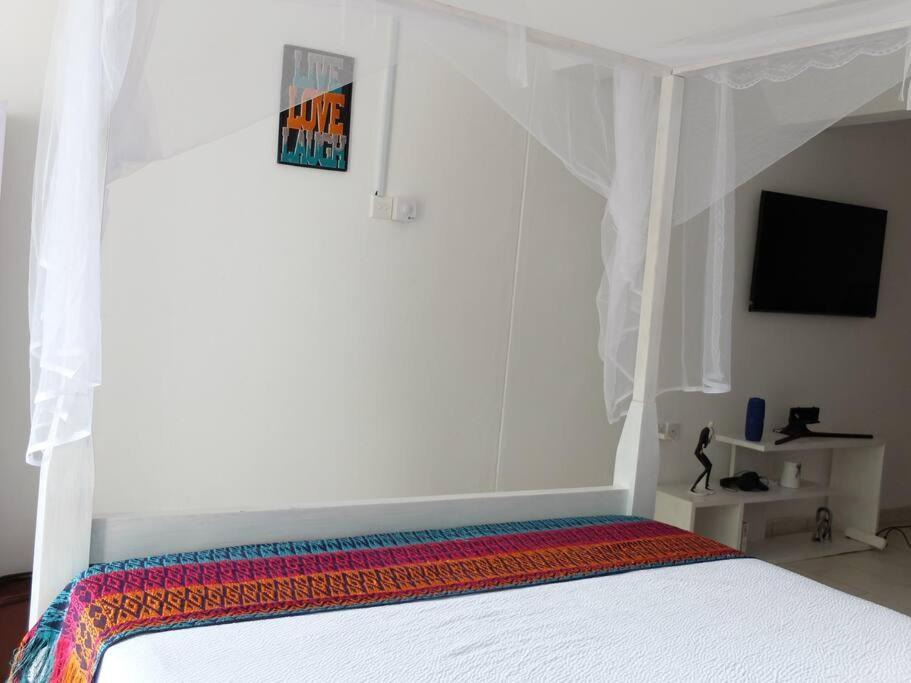 Restful Beach Front Studio-Diani Apartment เดียนีบีช ภายนอก รูปภาพ